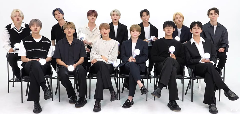 Photo of the KPOP group Seventeen, showing the large (13 member) group. Used to show what it's like to feel that your KPOP bias is underrated.